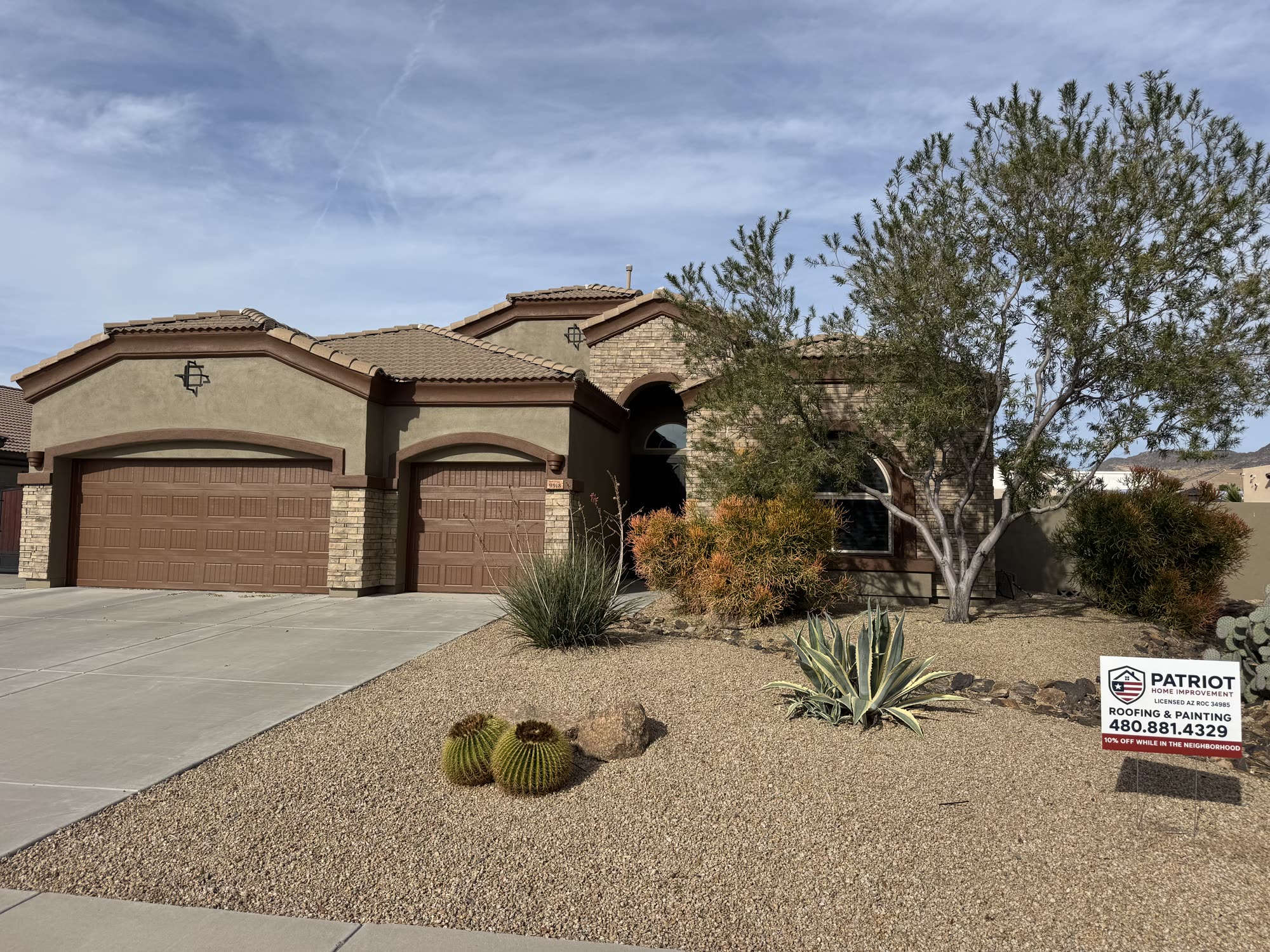 A Patriot Home Improvement crew finishing a home in Chandler, Arizona