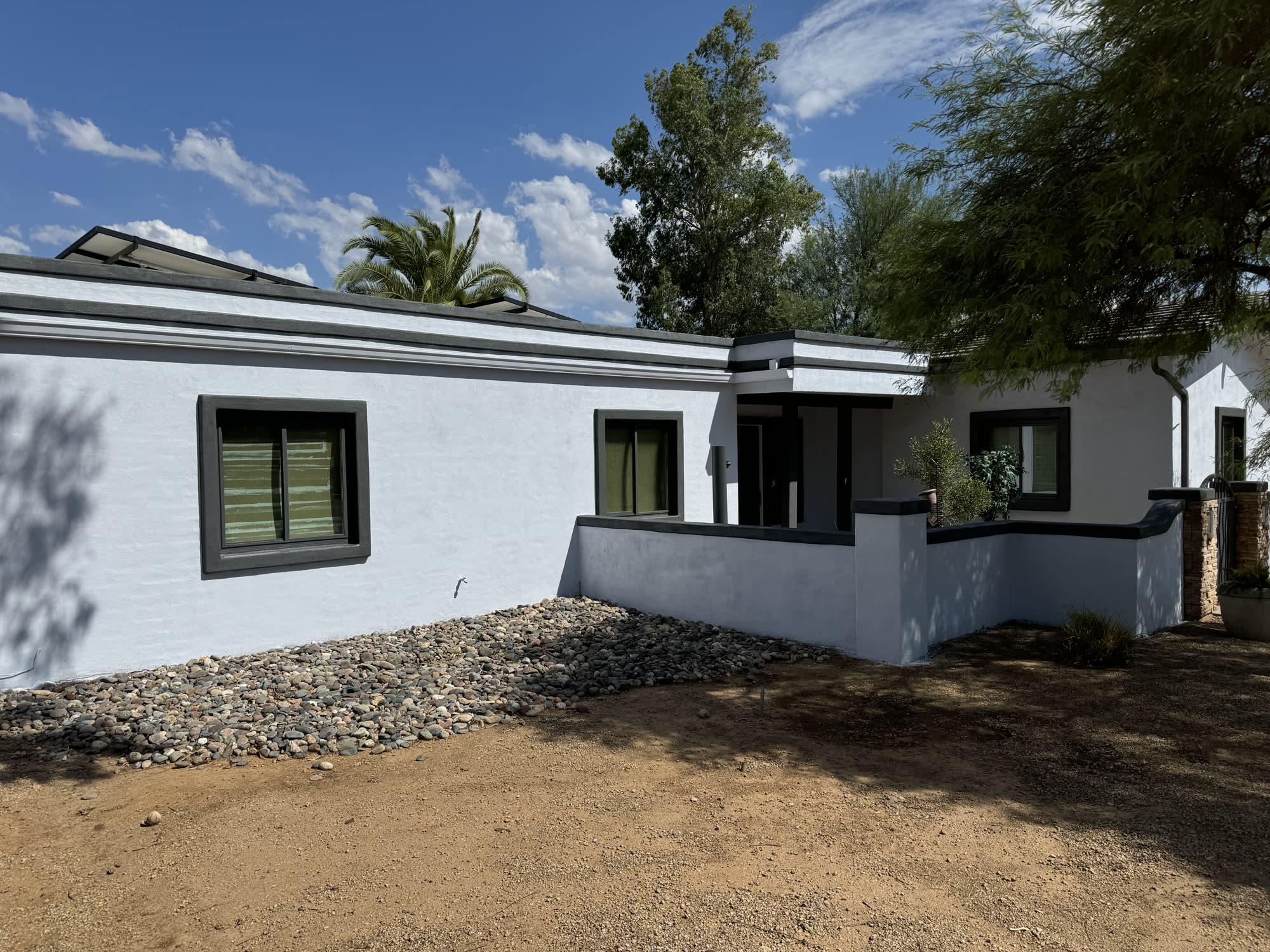 Two-story Arizona stucco home freshly painted