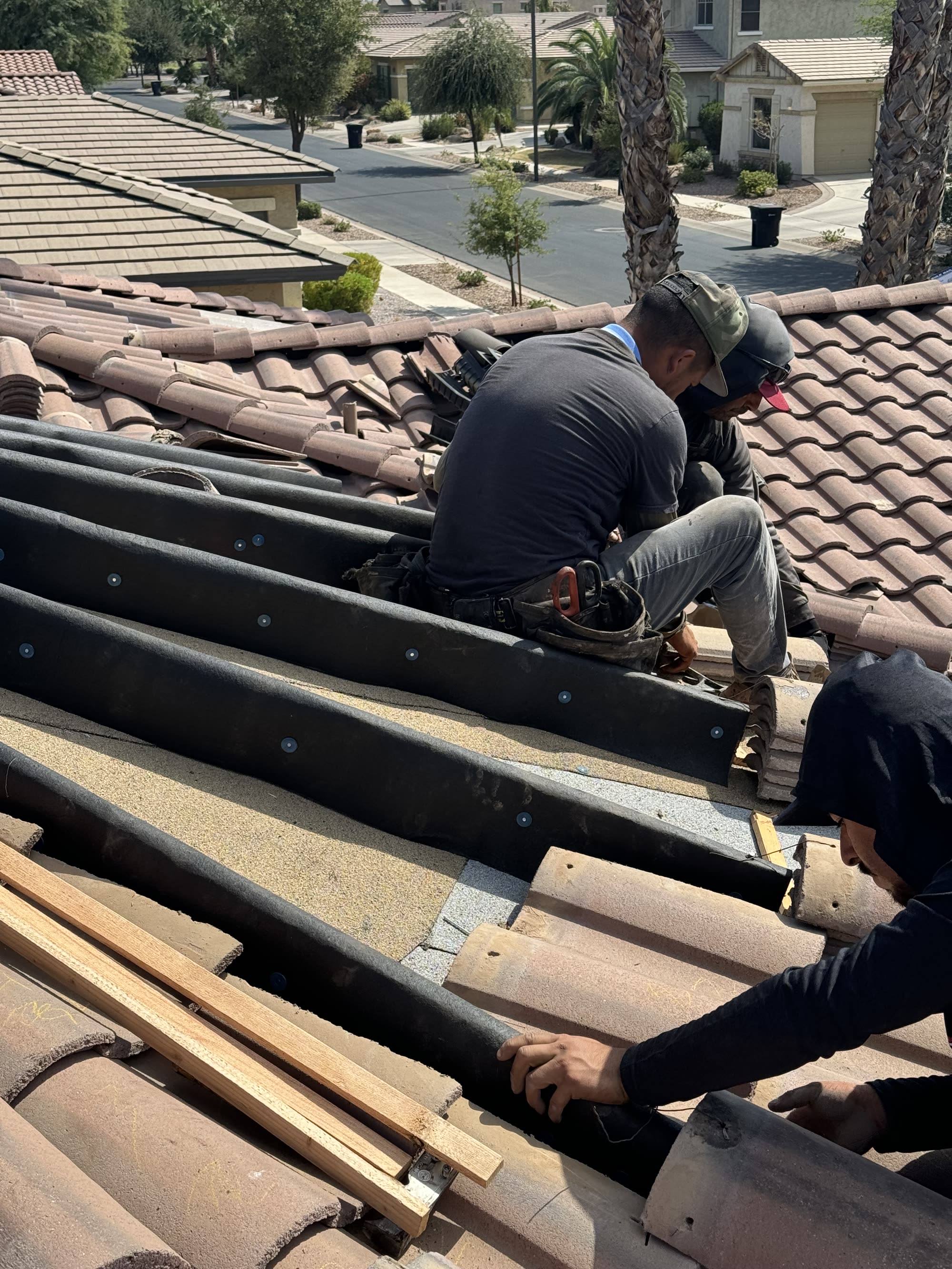Tile roof repair in progress